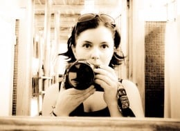 girl self portrait with camera