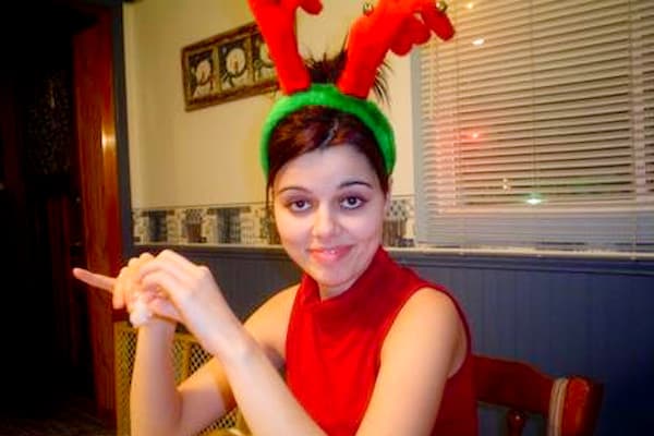 girl with reindeer hat