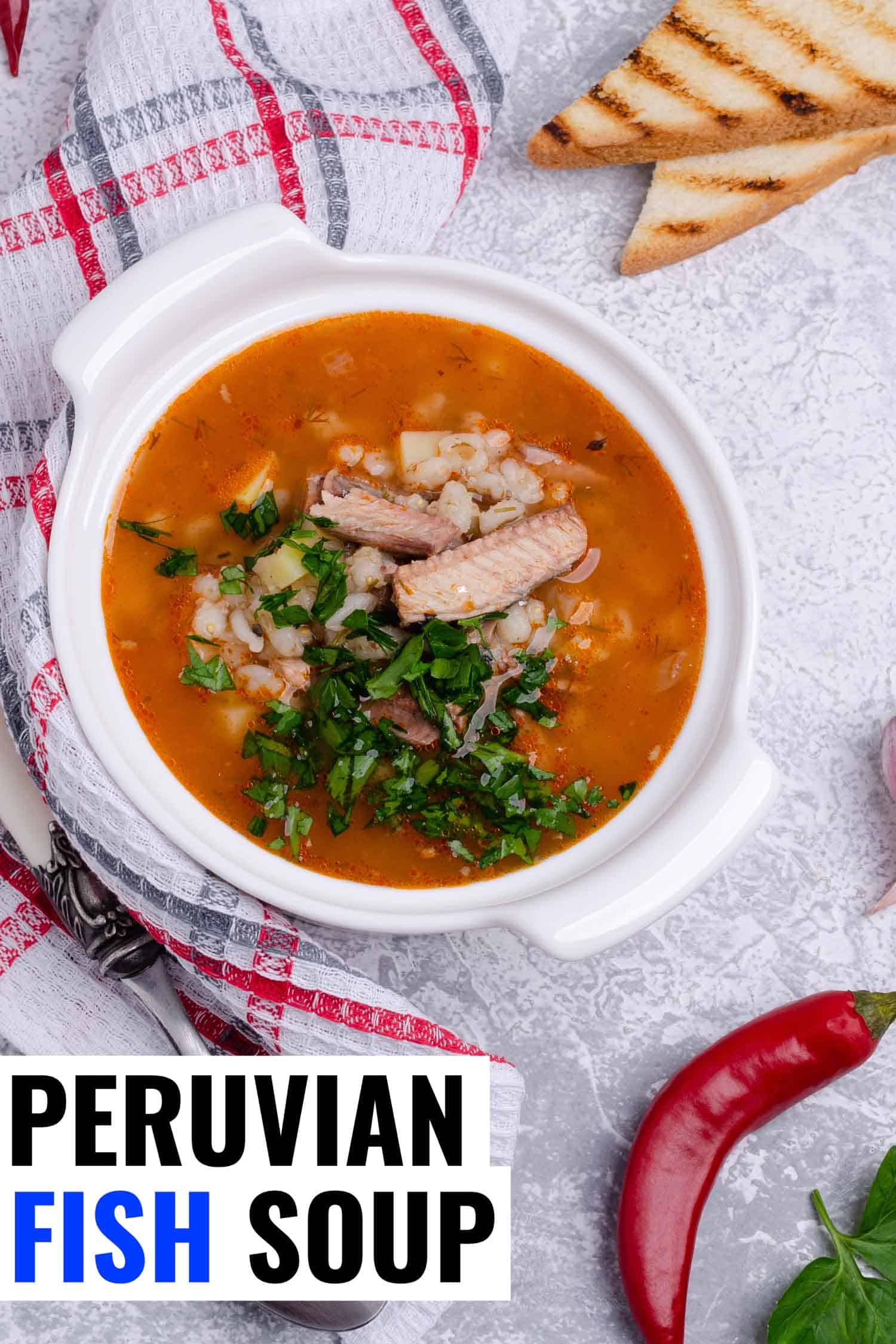 Peruvian fish soup called sudado in a white bowl.