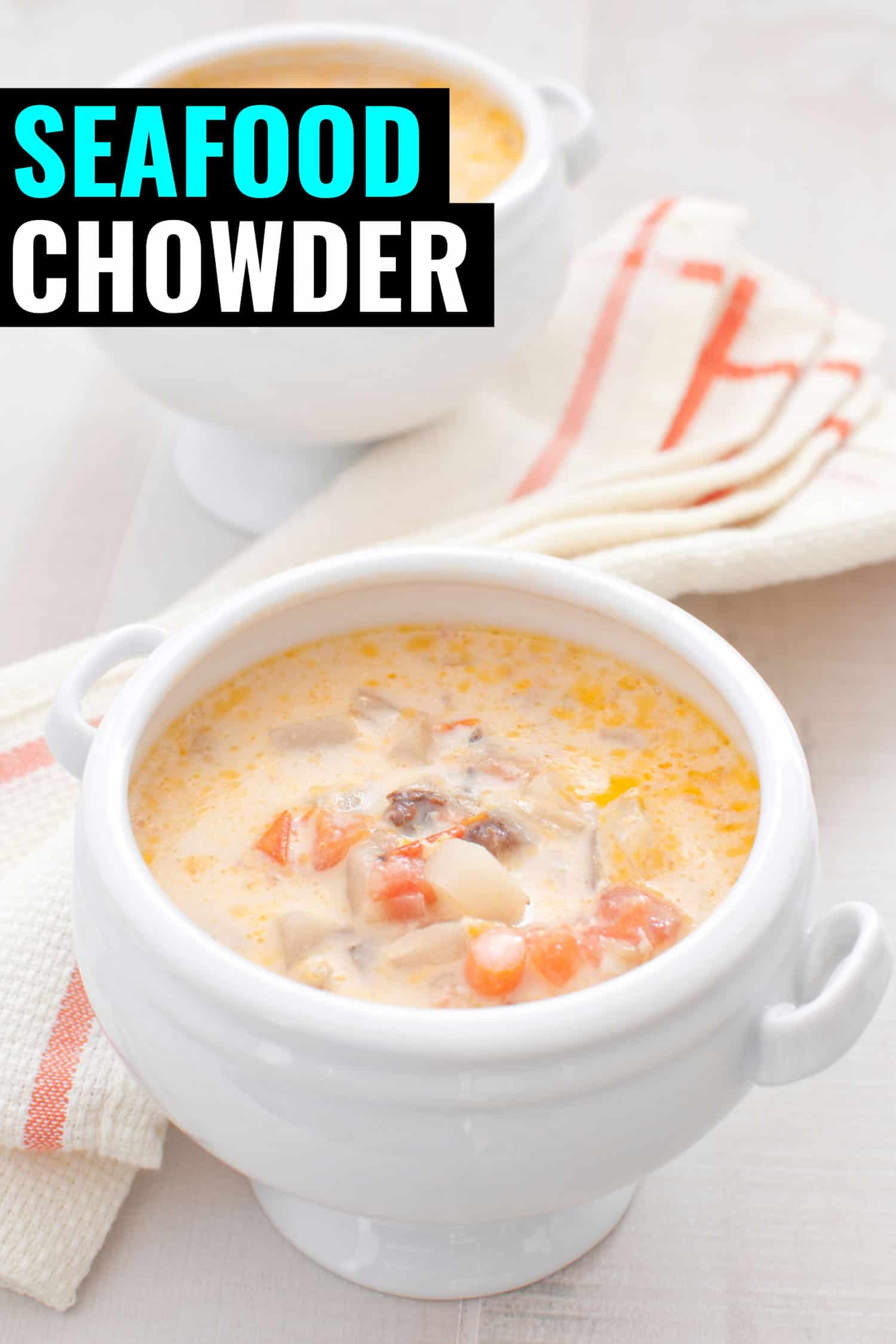 Nova Scotia creamy seafood chowder in a white bowl.