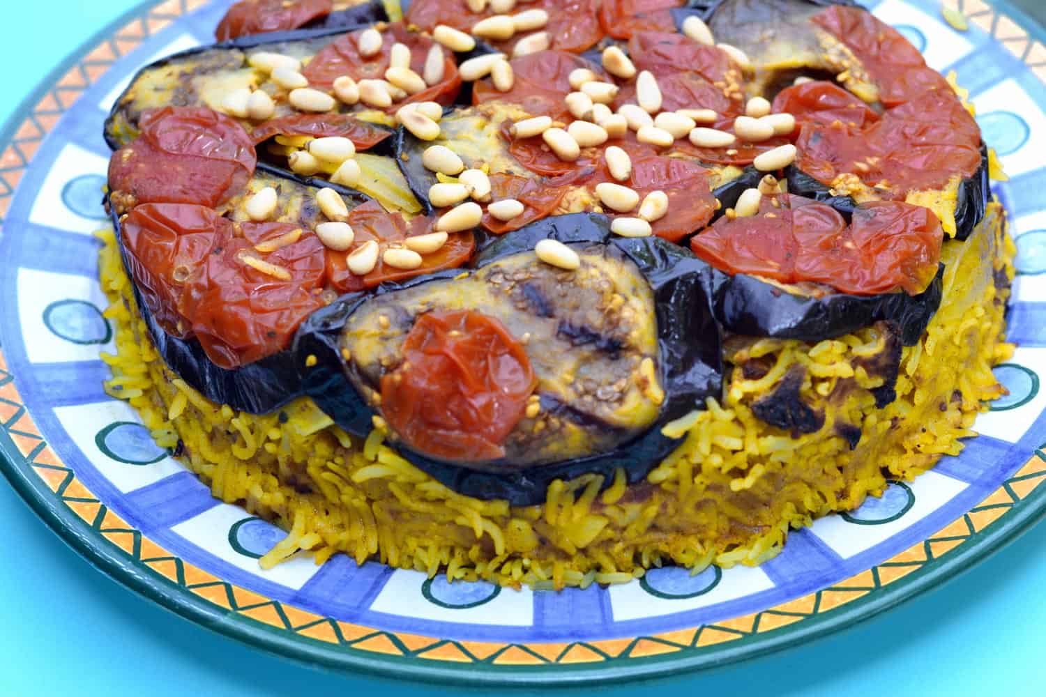 Jordanian food Maqluba, also knwn as Maklube; traditional upside-down casserole made with fried vegetables, chicken or lamb. and rice