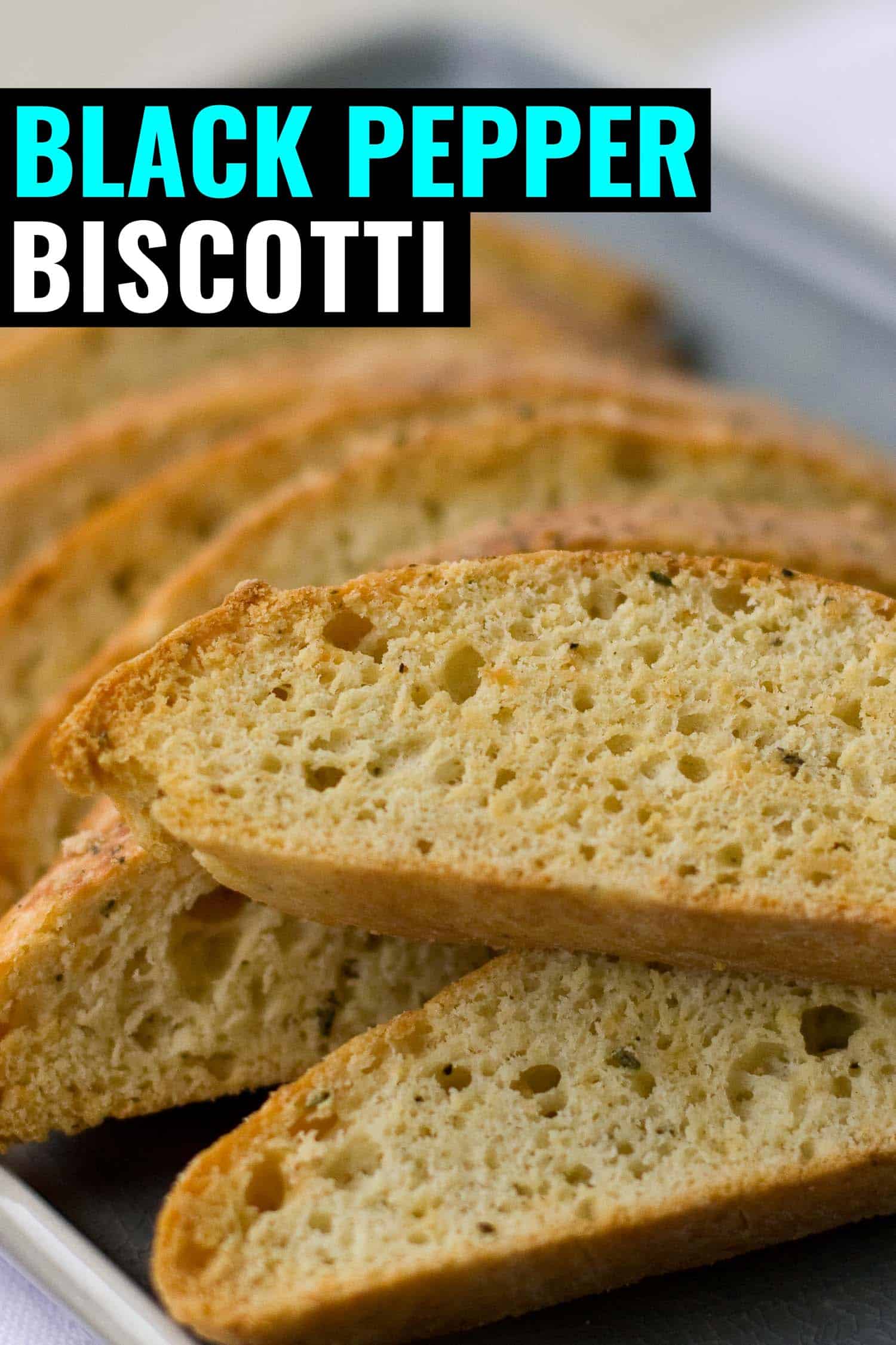 black pepper biscotti with parmesan on a blue plate