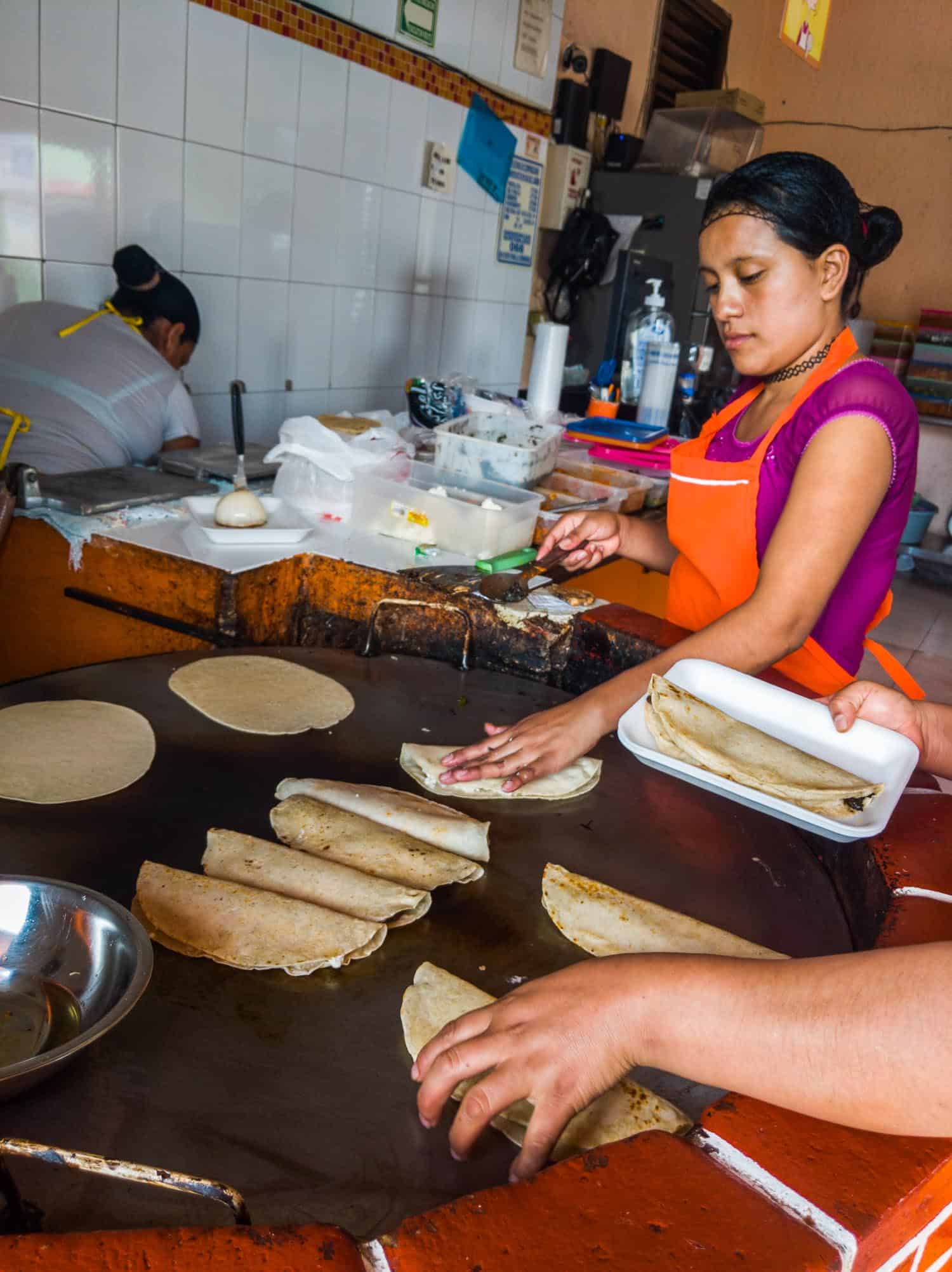 Las Quekas restaurant in Playa del Carmen, women making quesadillas