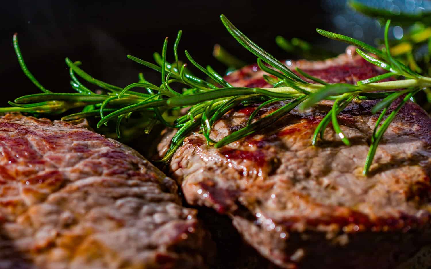 Grilled steak with rosemary