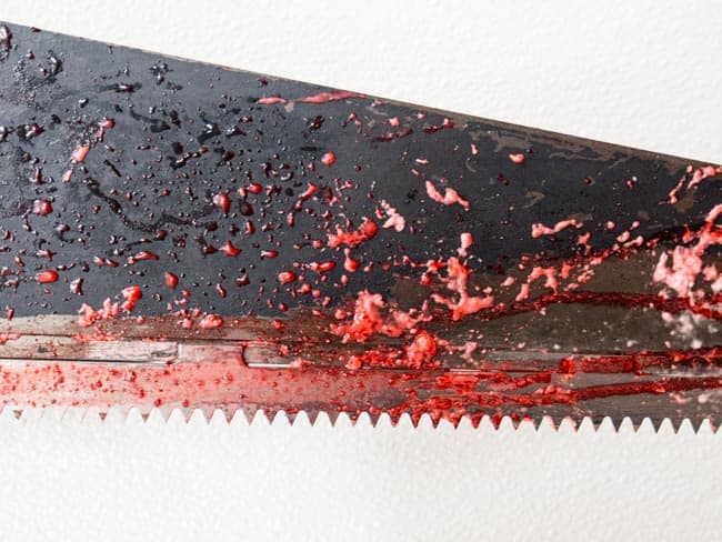 bloody saw at abattoir