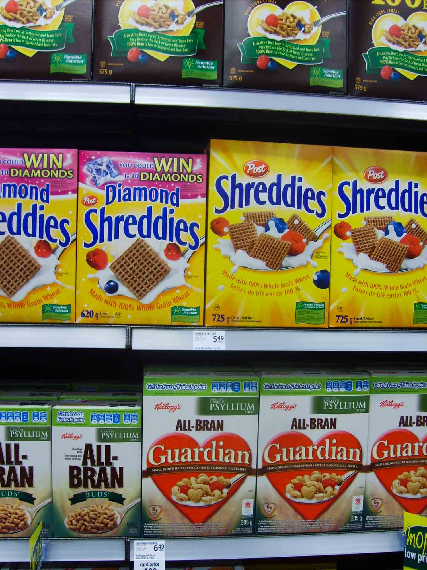 Canadian cereal Shreddies on a shelf.