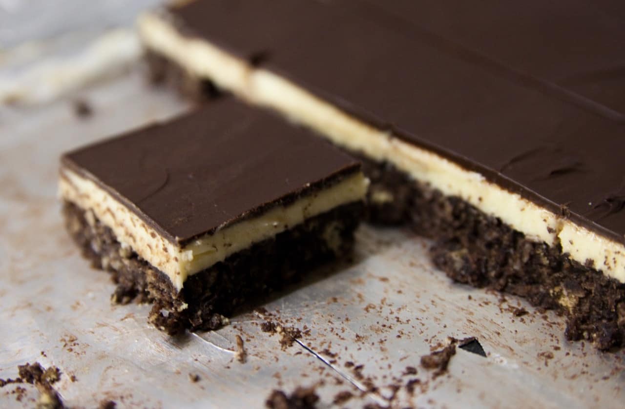 Nanaimo bars a Canadian dessert on wax paper.
