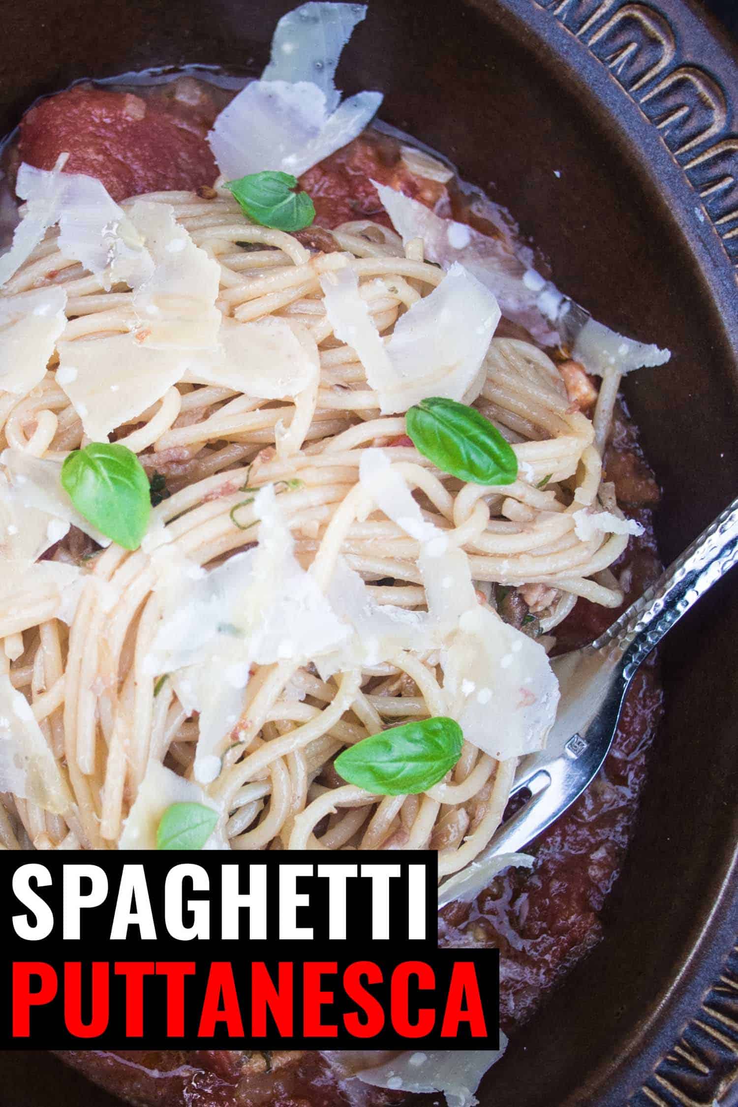 Italian spaghetti puttanesca pasta in a bowl.