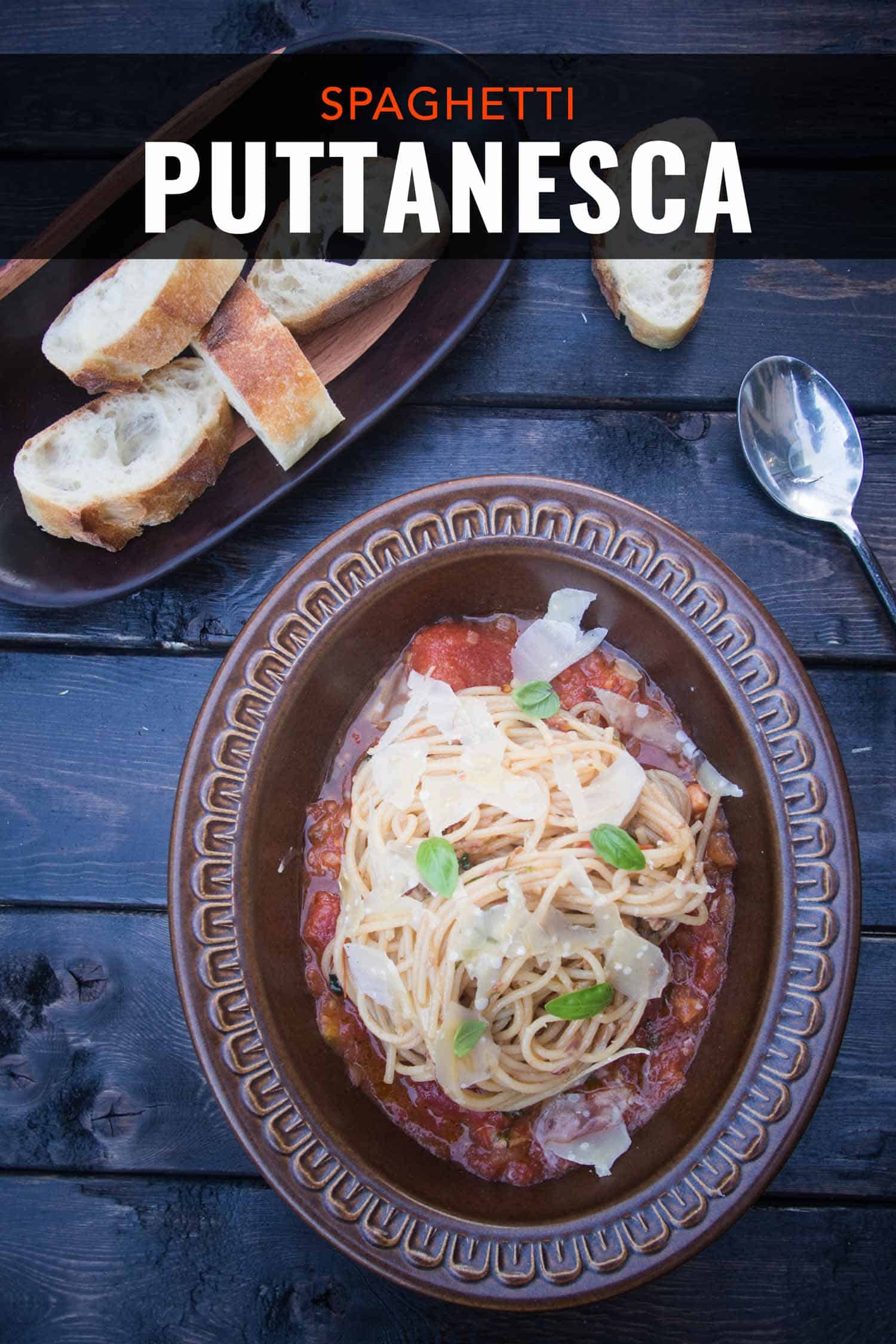 Italian spaghetti puttanesca pasta in a bowl.
