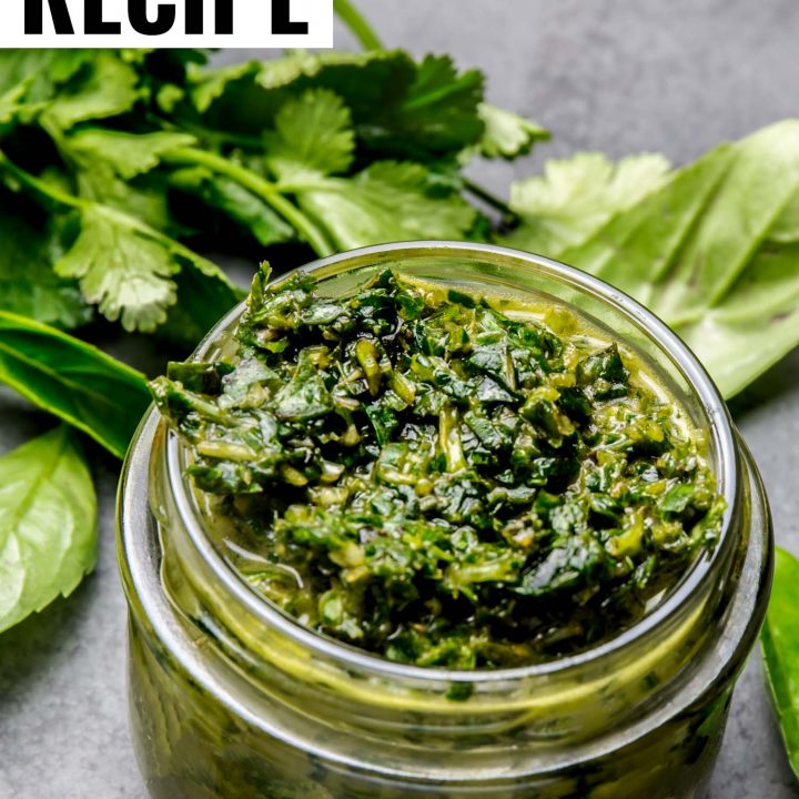 Fresh chimichurri in a glass small jar