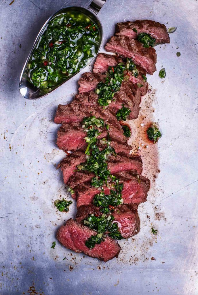 Chimichurri sauce on steak