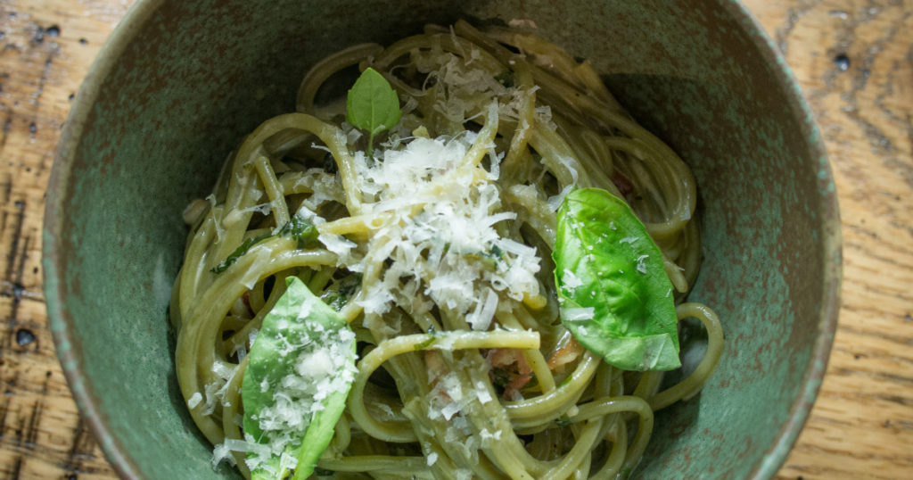 Garlic pasta with basil cream and pancetta sounds like a decadent pasta but this chef's recipe is ready in 15 minutes.