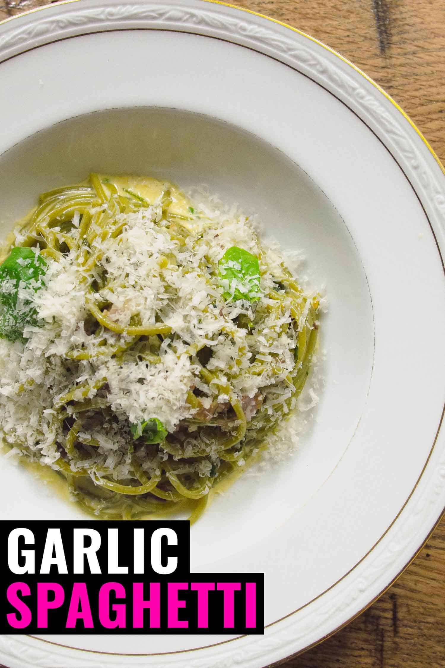 Roasted garlic pasta in a white bowl on a wooden background