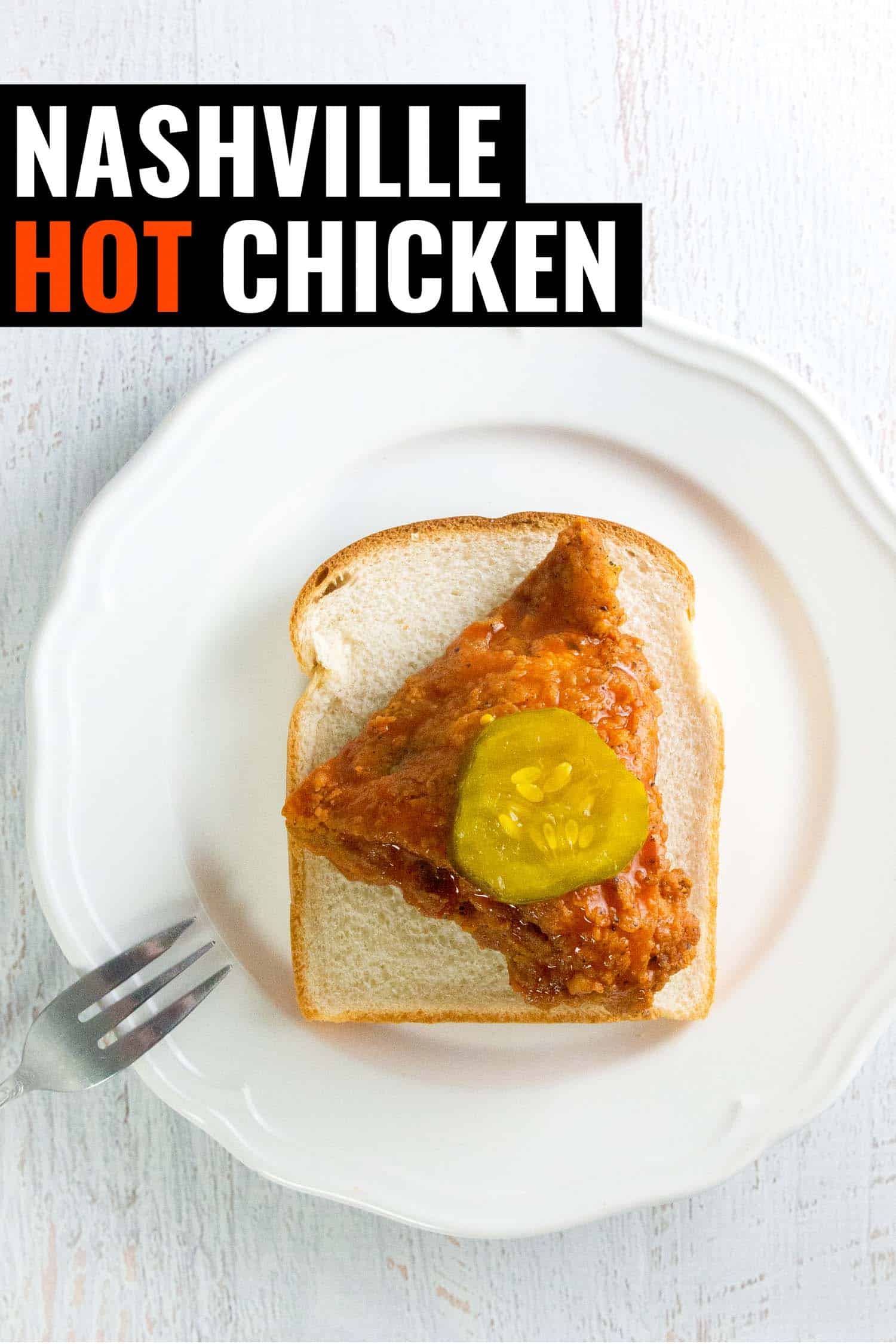 Nashville hot fried chicken on a white plate and white background