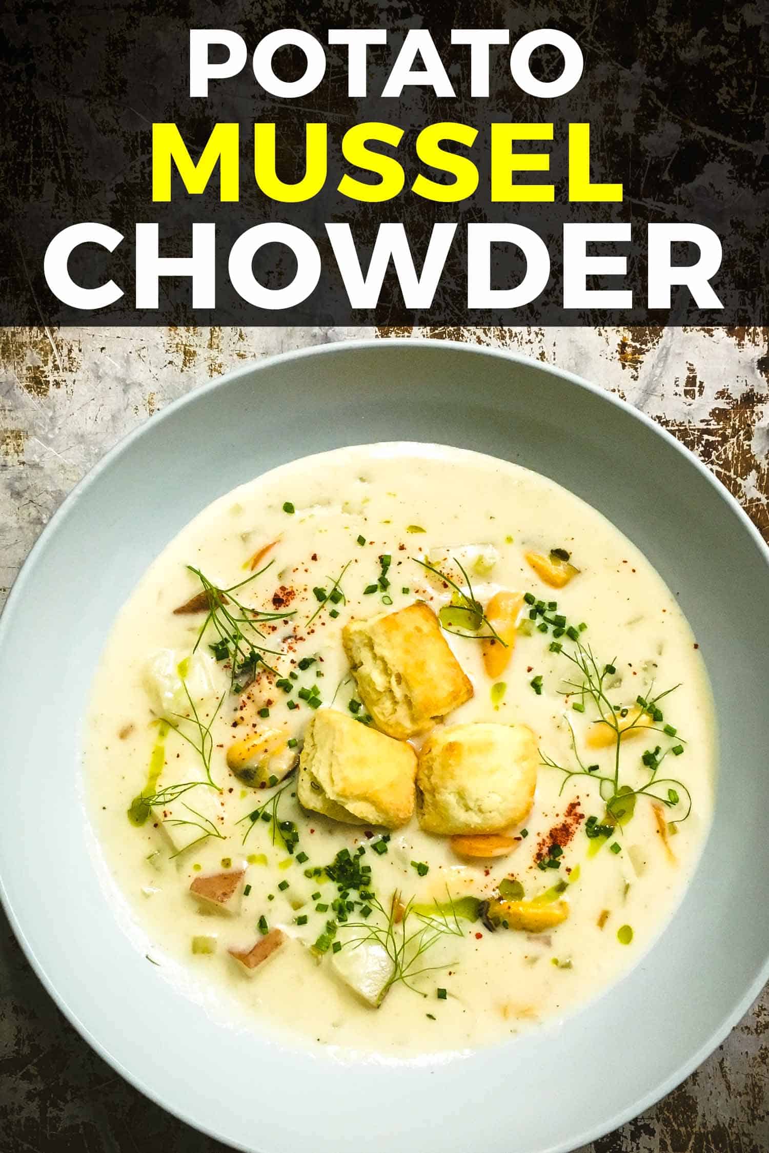 potato mussel chowder in a light blue bowl