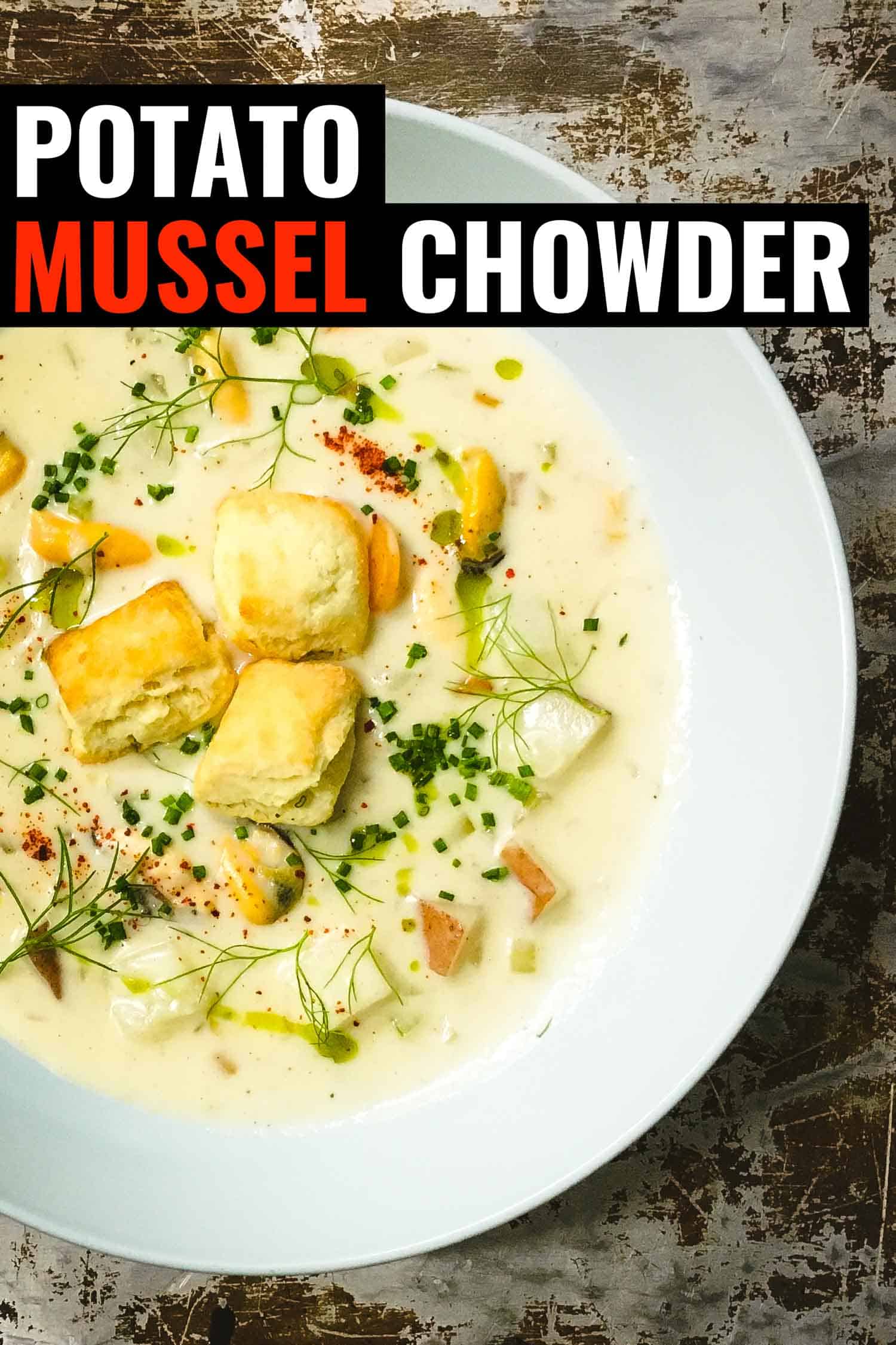 potato mussel chowder on a rustic background