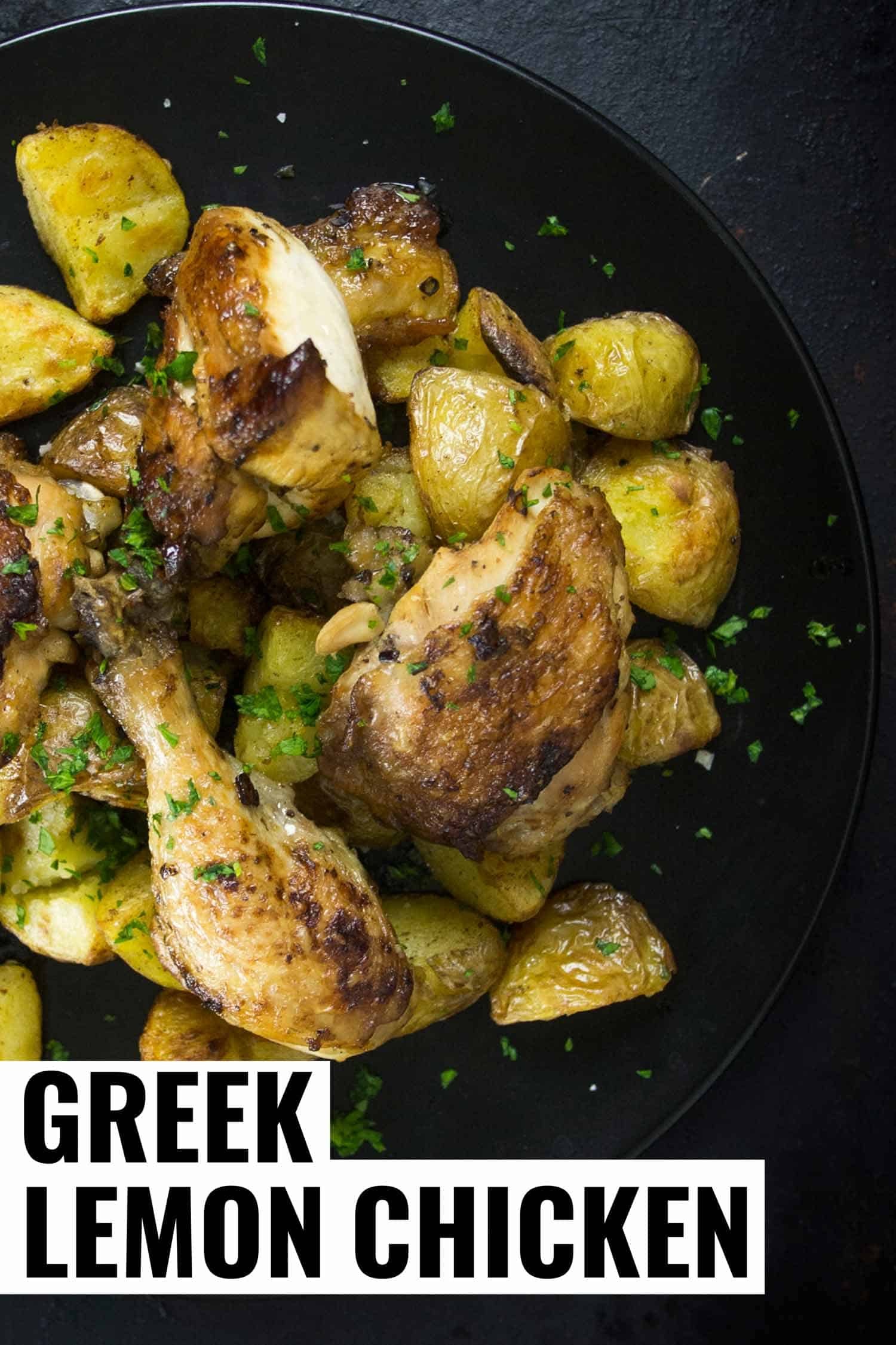 greek lemon chicken on a black plate