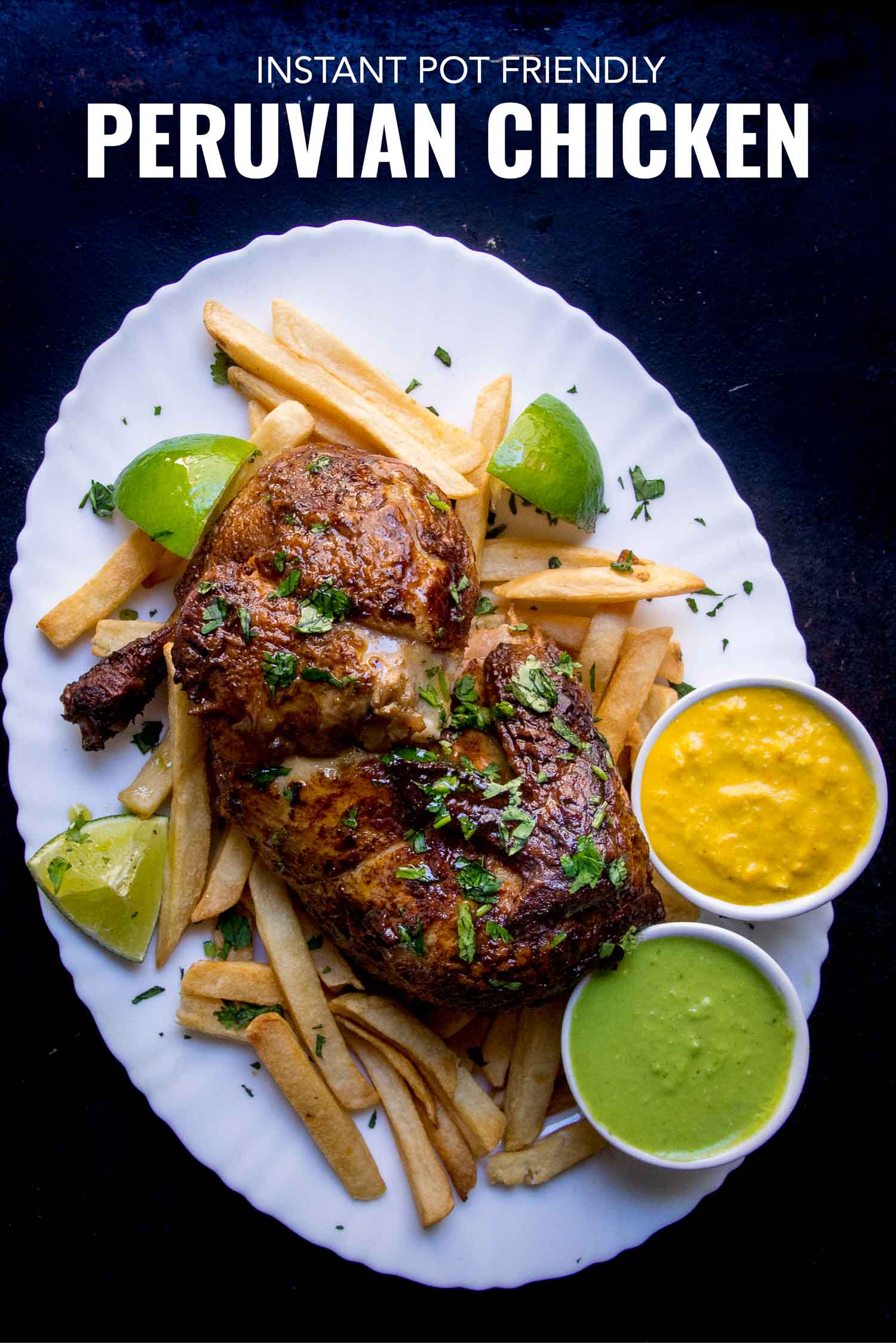 peruvian chicken with french fries and aji sauces on a white plate