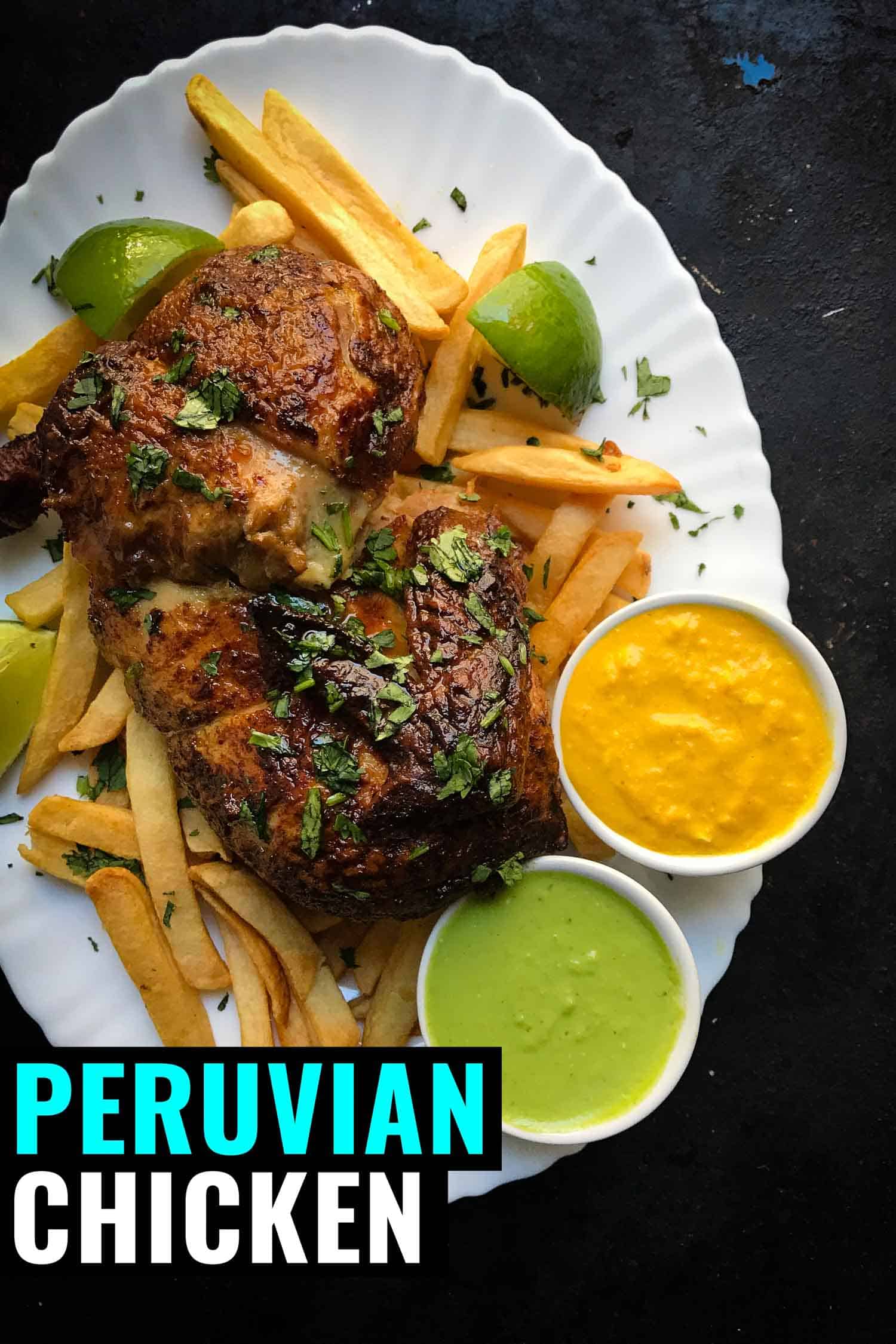 peruvian chicken with french fries and aji sauces on a white plate