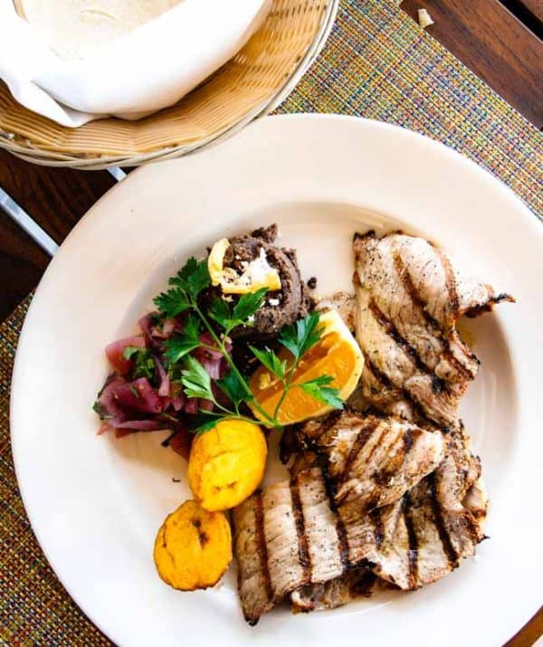 poc chuc Poc chuc in Mexico is Mayan grilled pork that is marinated in sour orange juice and served with pickled onions.