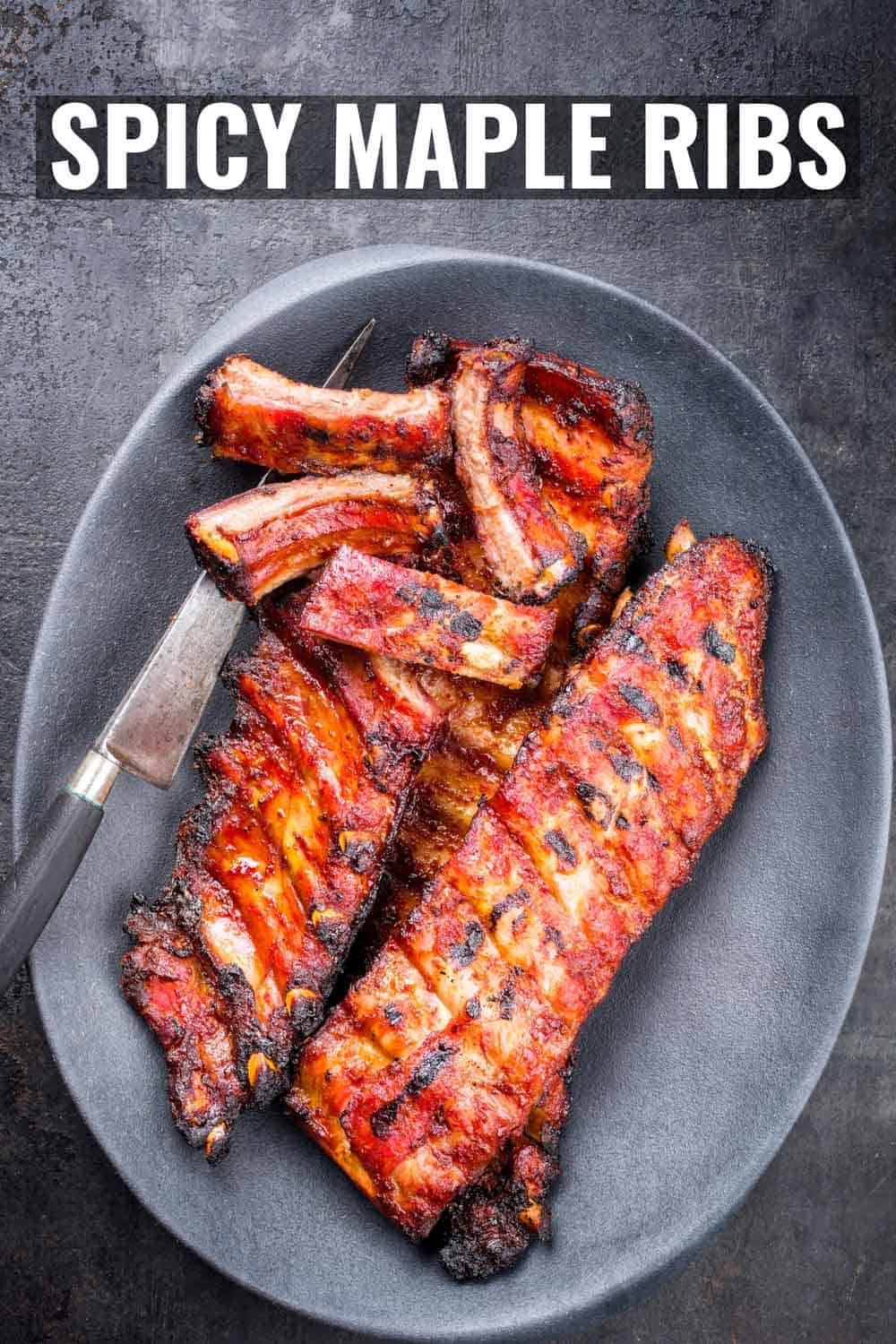 Instant pot barbecue spare ribs St Louis cut with hot honey chili marinade as top view on a modern design cast iron pan