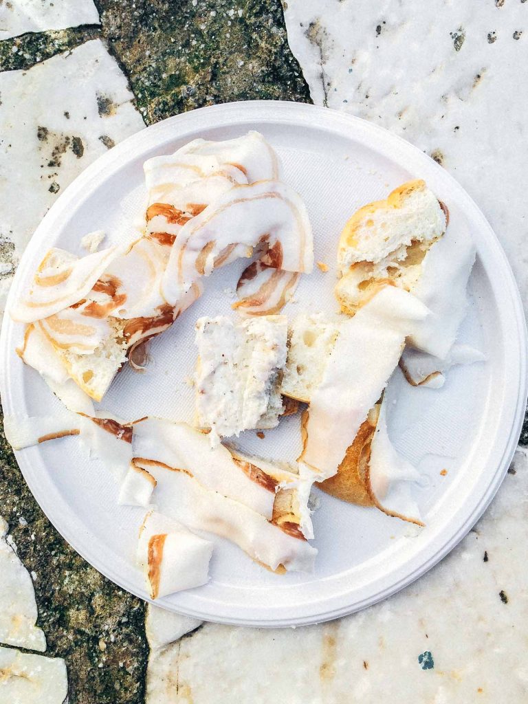 Sliced lardo on a plate in Colonnata Italy