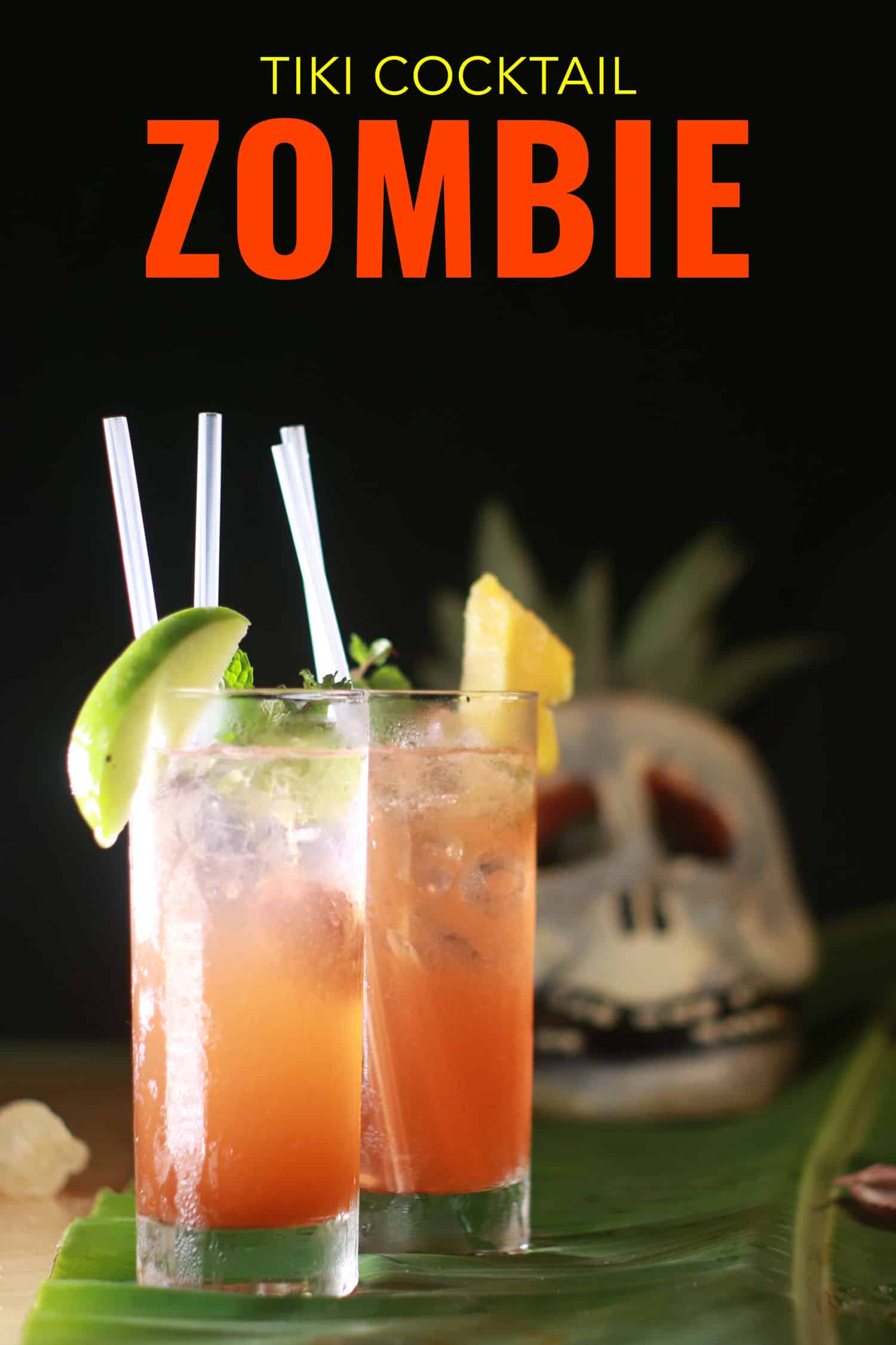 Tiki cocktail called the zombie with a skull behind it