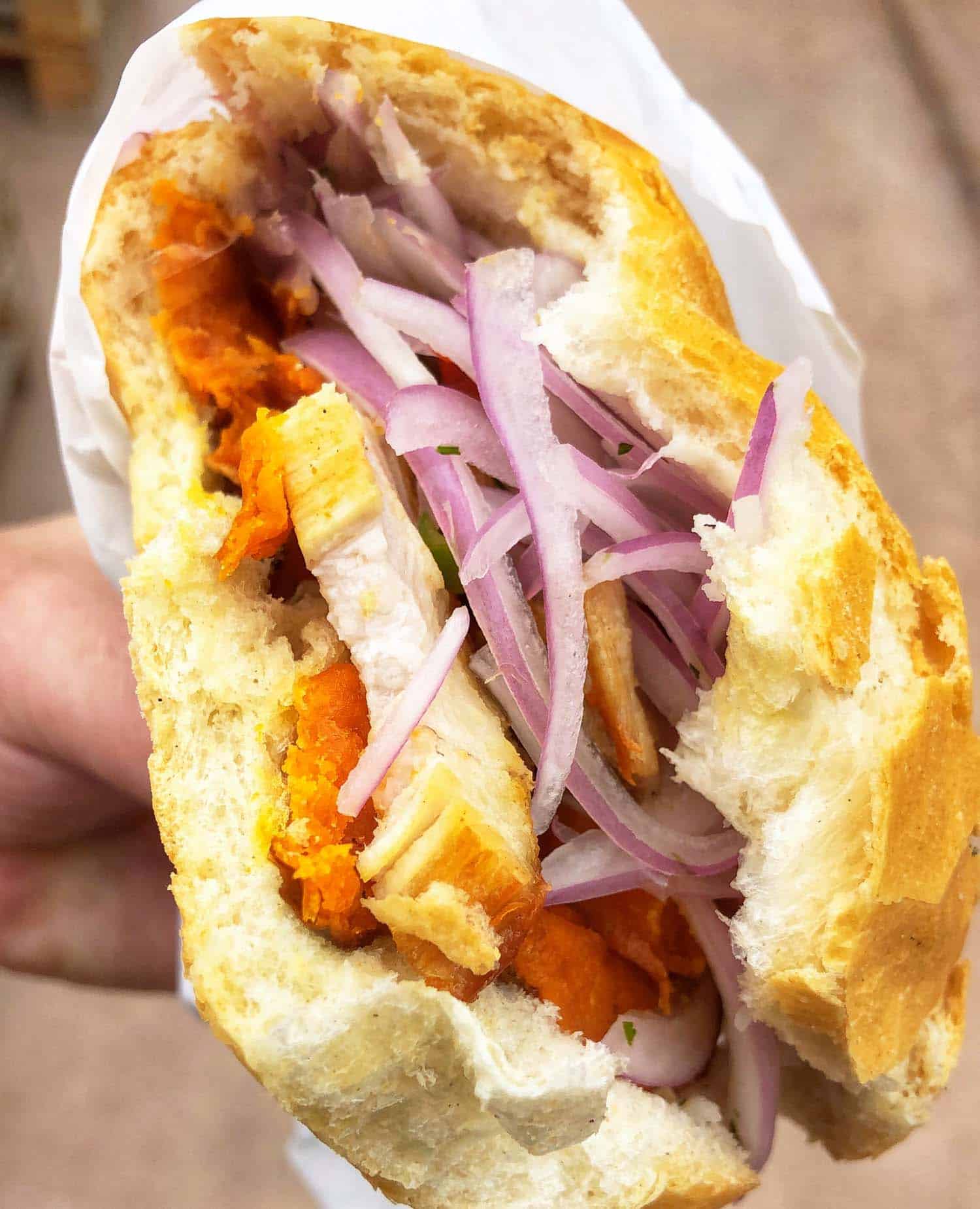 Pan con chicharron in Peru is one of the most iconic, best sandwiches in the world.