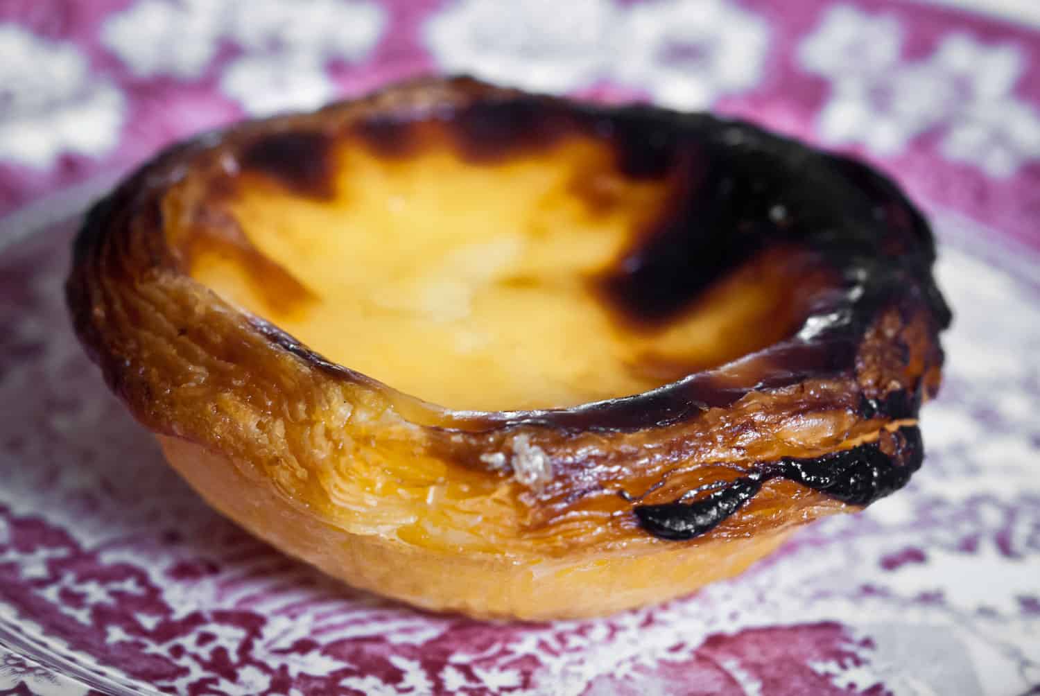 Pastel de Nata is a traditional food in Lisbon you don't want to miss, discover the other Portuguese food you should eat.