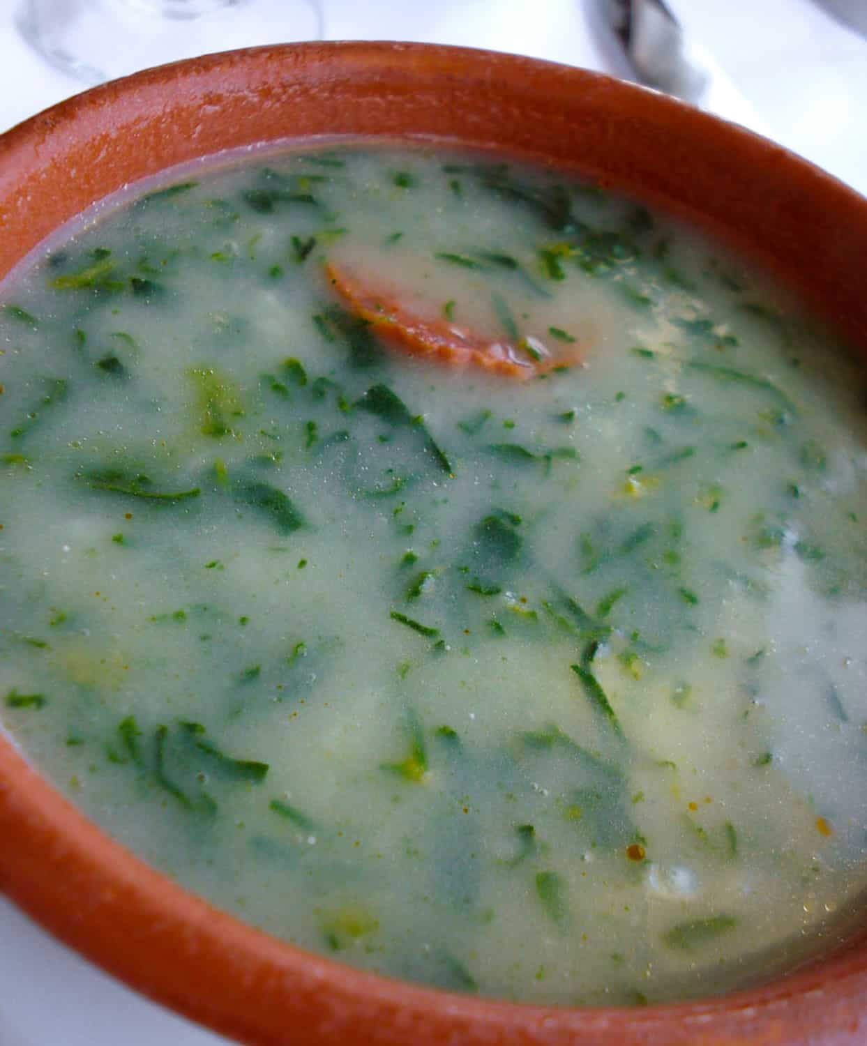 Caldo verde is a traditional food in Lisbon you don't want to miss, discover the other Portuguese food you should eat.