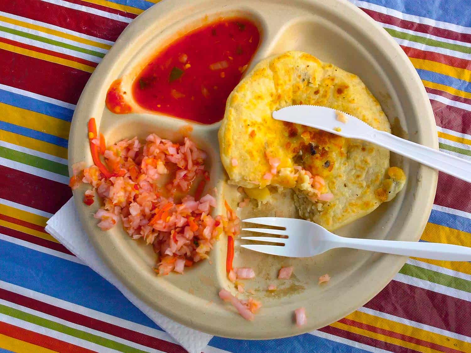 Pupusa are just one Guatemalan food you need to try in this guide to Guatemalan cuisine.