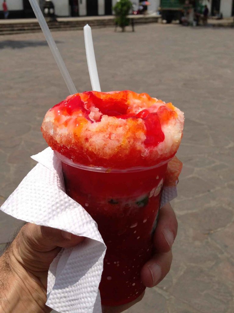 Raspao is a dessert in Panama made from shaved ice covered in fruit and syrup.