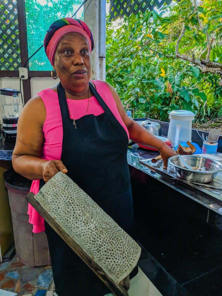 Using a coconut grater to make Caribbean rice and beans.