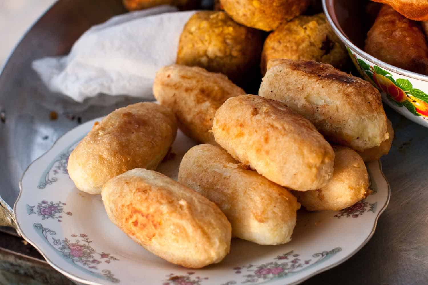 Traditional Panama snack, carimañolas are mashed yucca then stuffed and deep fried.
