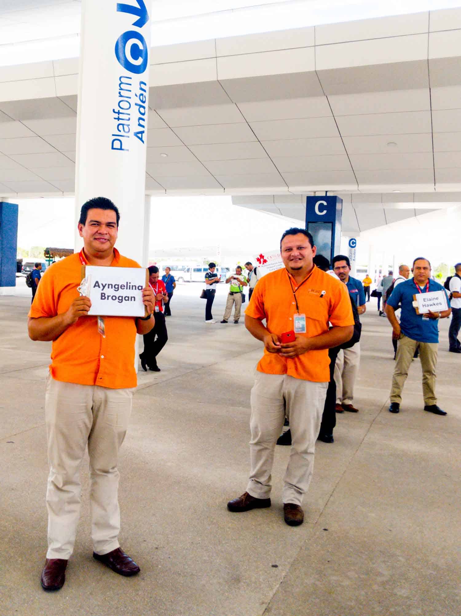 Airport shuttle Yucatan travel pick up with sign.