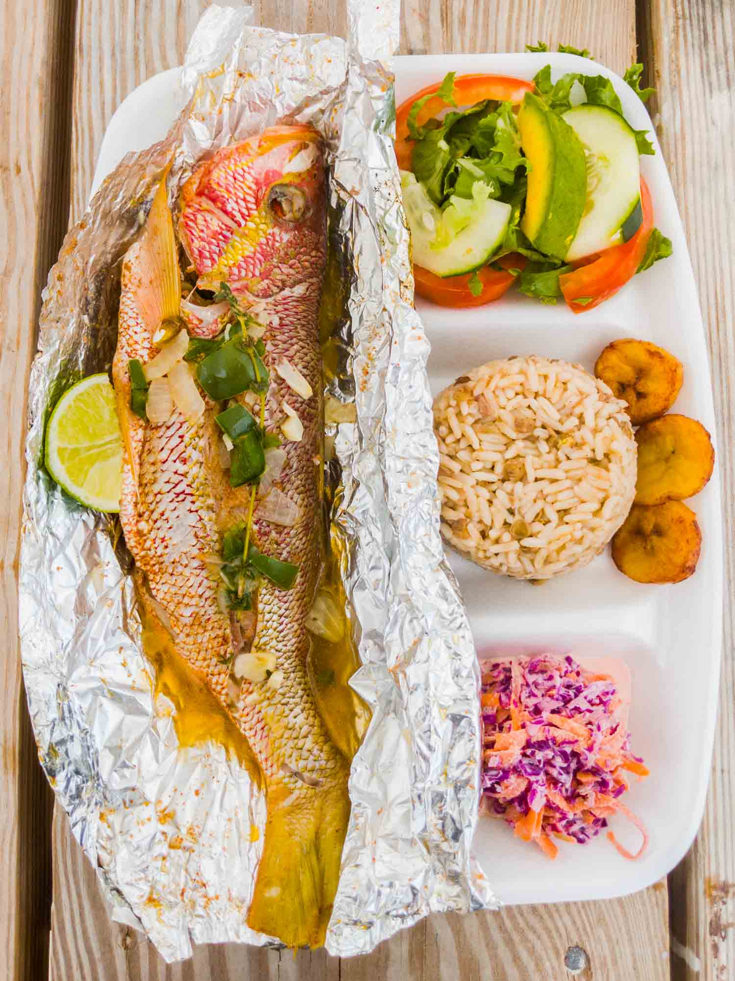 Foil roasted snapper and sides from Sunshine Shack in Anguilla.