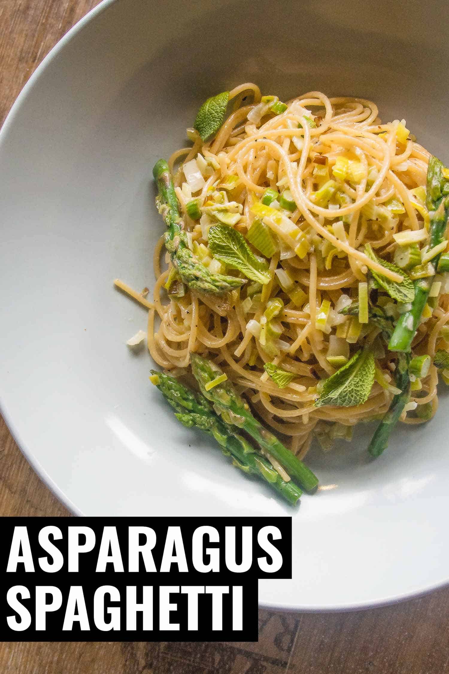 asparagus pasta in a bowl with lemon cream and leek