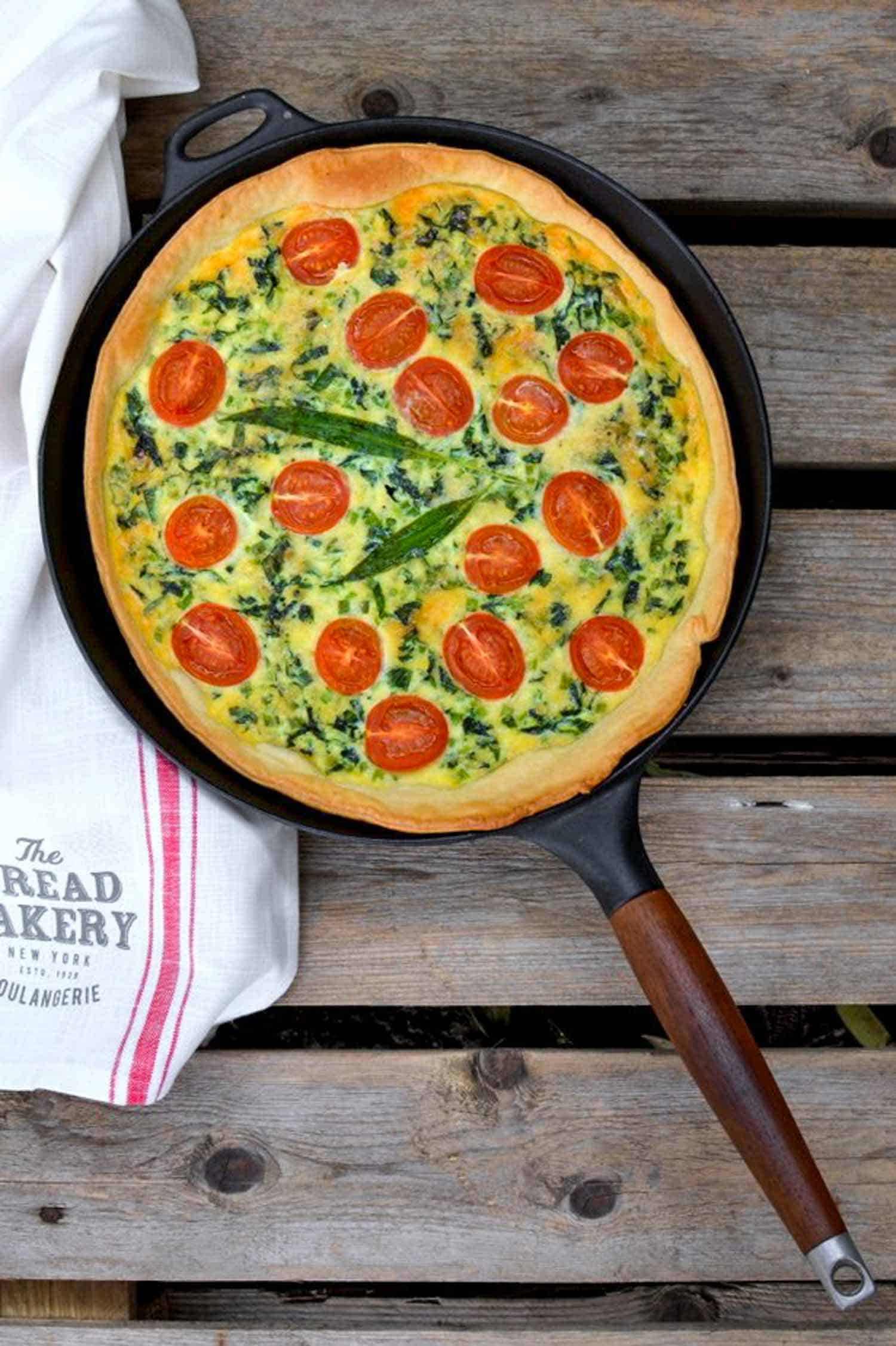 Popular ramps recipe of ramps and cherry tomato pie