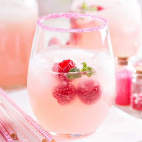 Rose sangria with ice in a glass