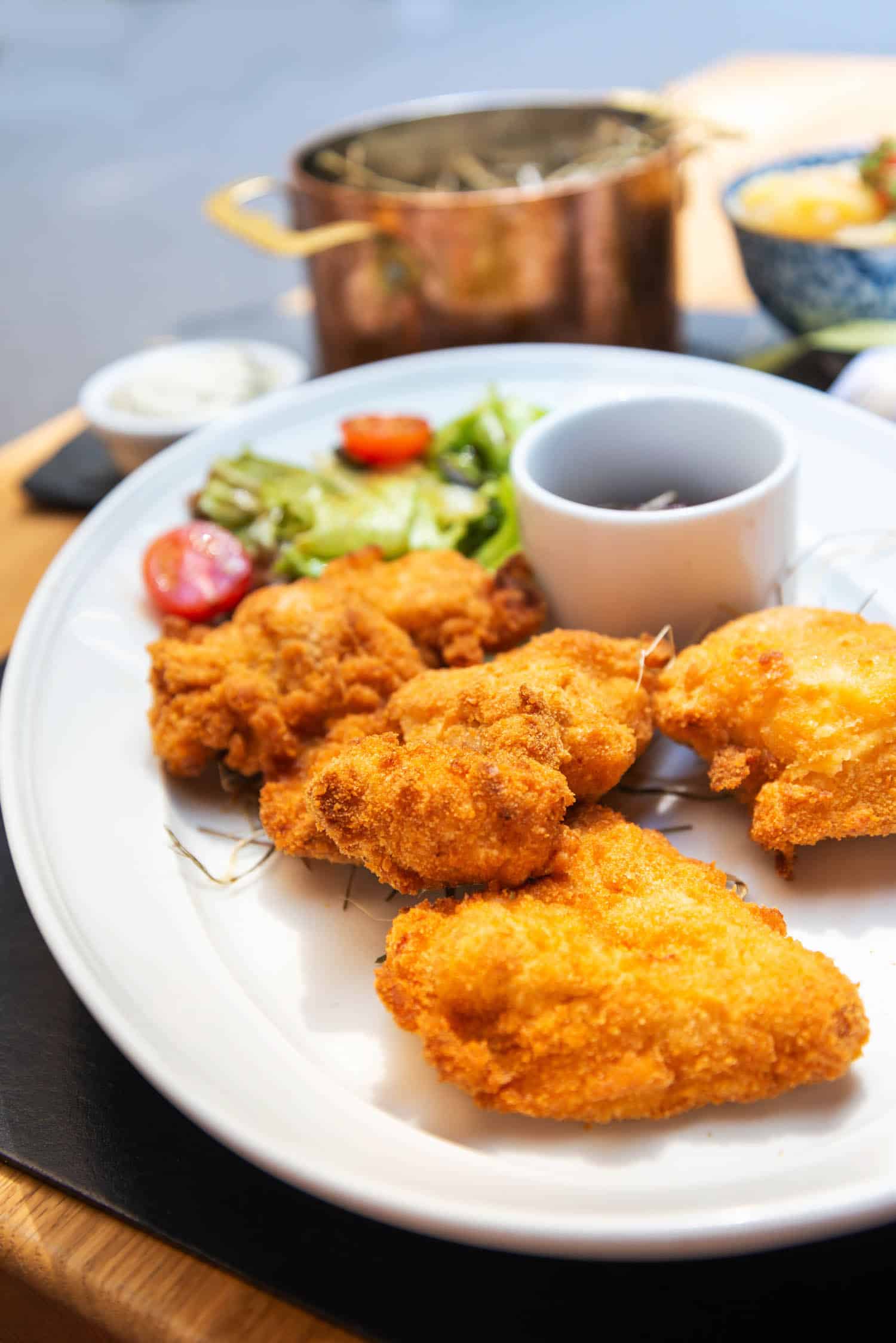 Argentinian food, milanesa or breaded cutlet on a plate