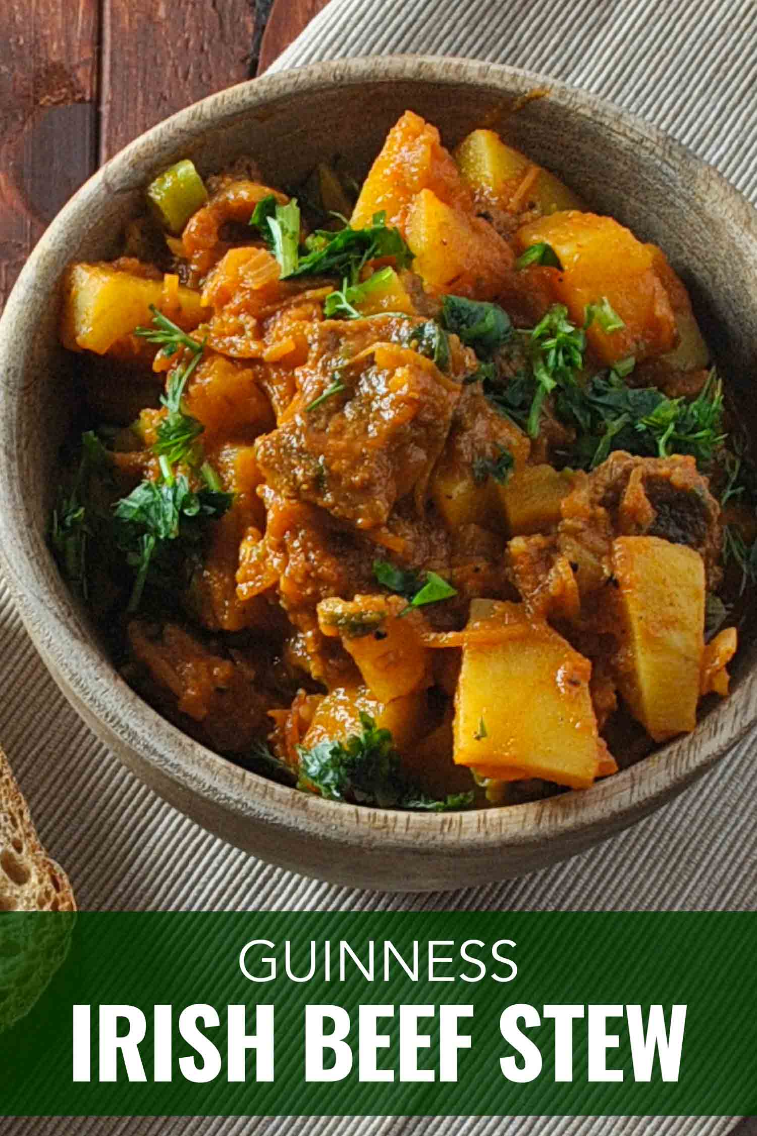 Irish beef stew in pottery on a wooden table