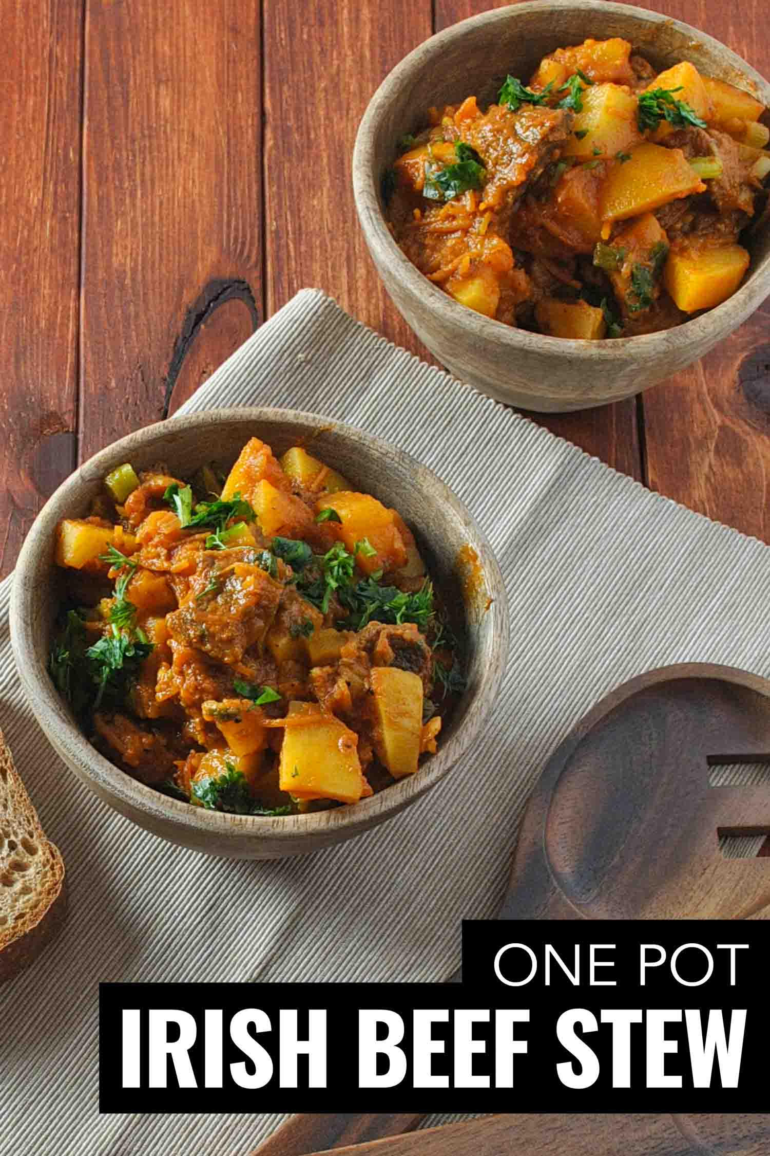 Irish beef stew in pottery on a wooden table