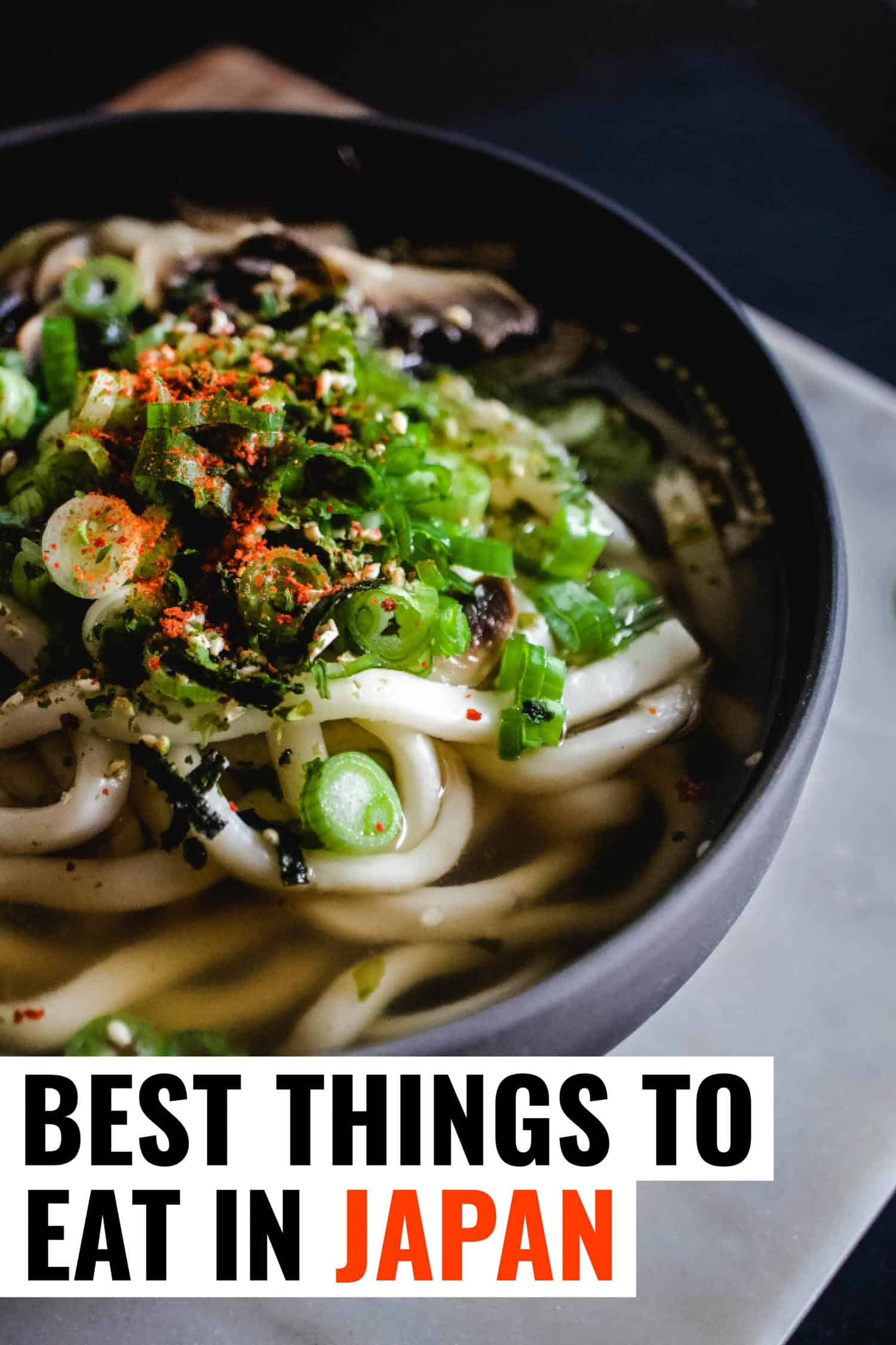 Soba noodles in a blue bowl, a traditional dish in Japanese cuisine