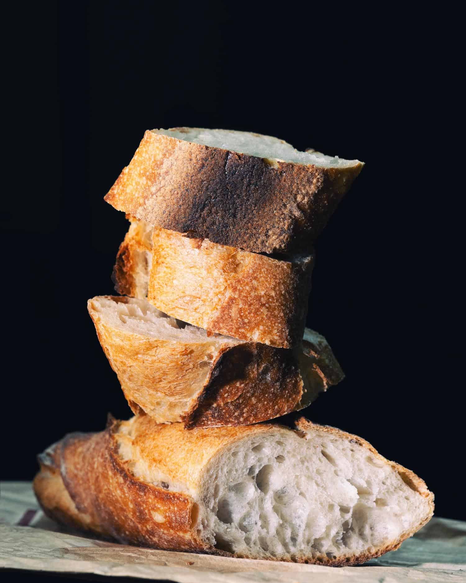 French baguette on black background