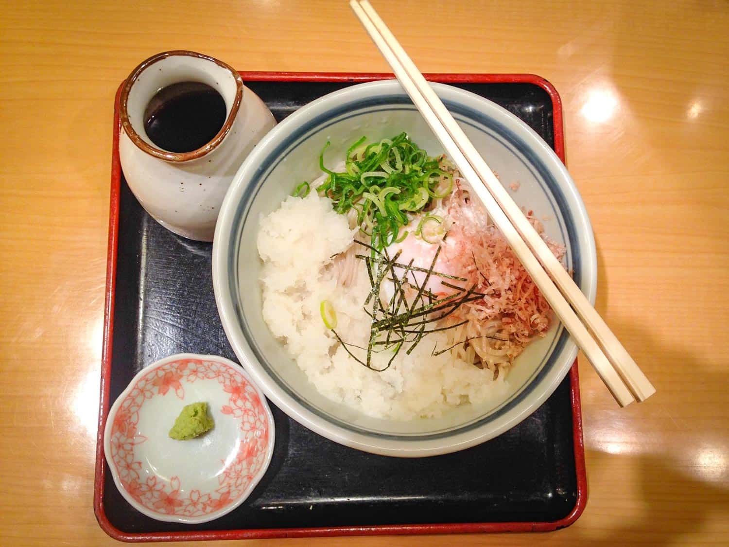 Oroshi soba in a white bowl with chopsticks