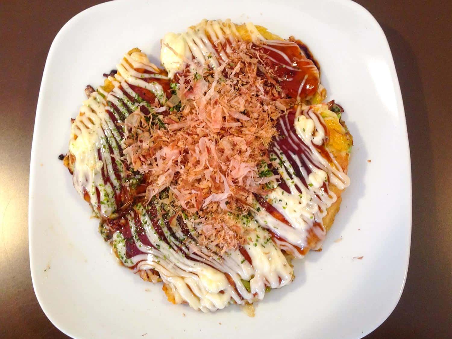 Okonomiyaki is a common thing to eat in Japan