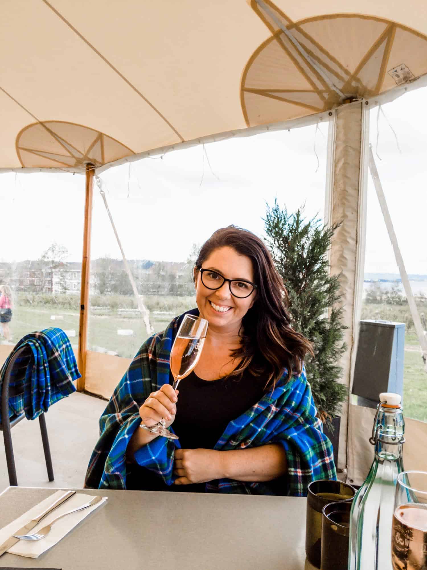 Ayngelina drinking rose sparkling at Lightfoot & Wolfville, a stop on the Wolfville wine bus.