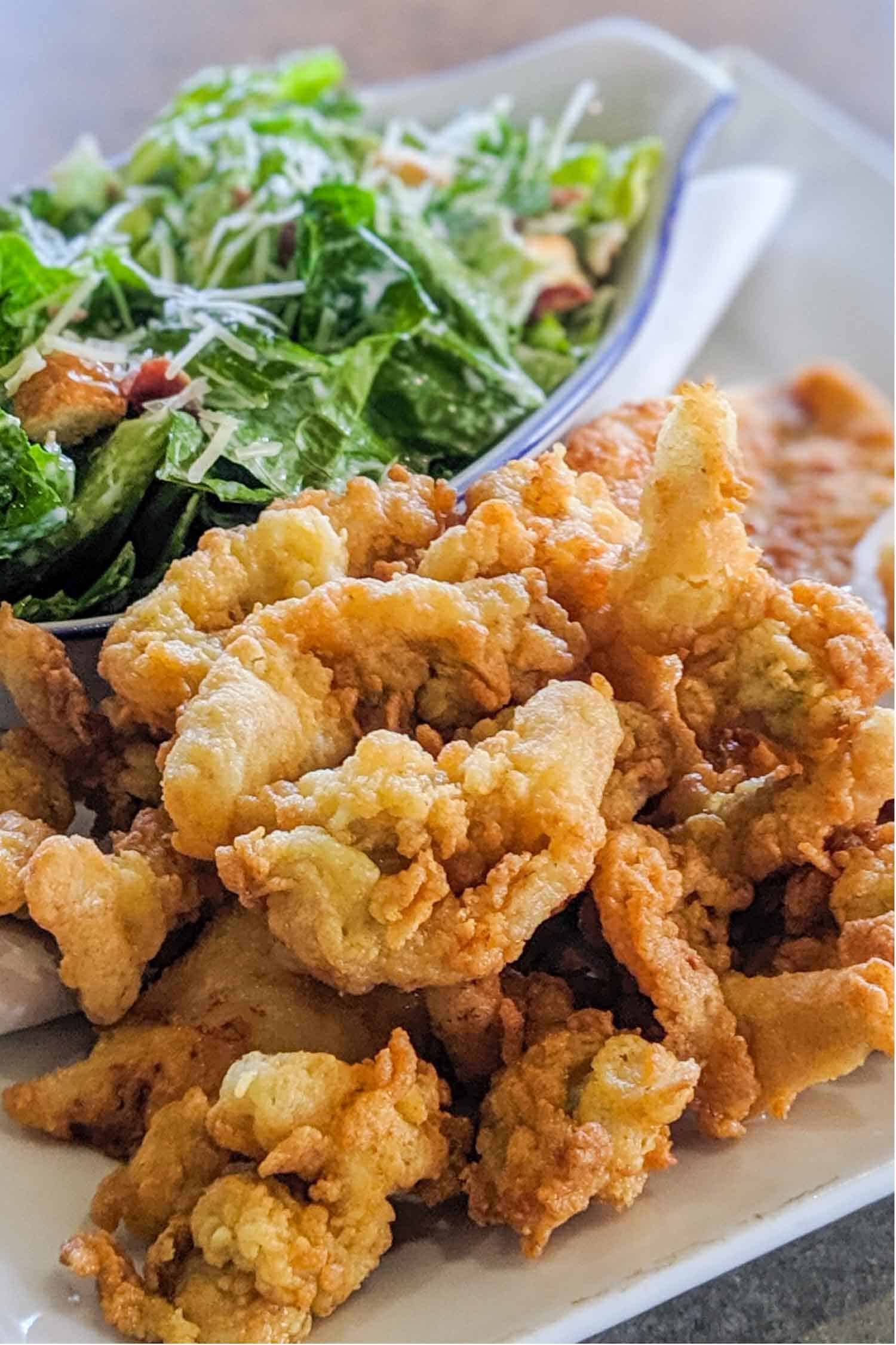 Fried clam strip and cesar salad