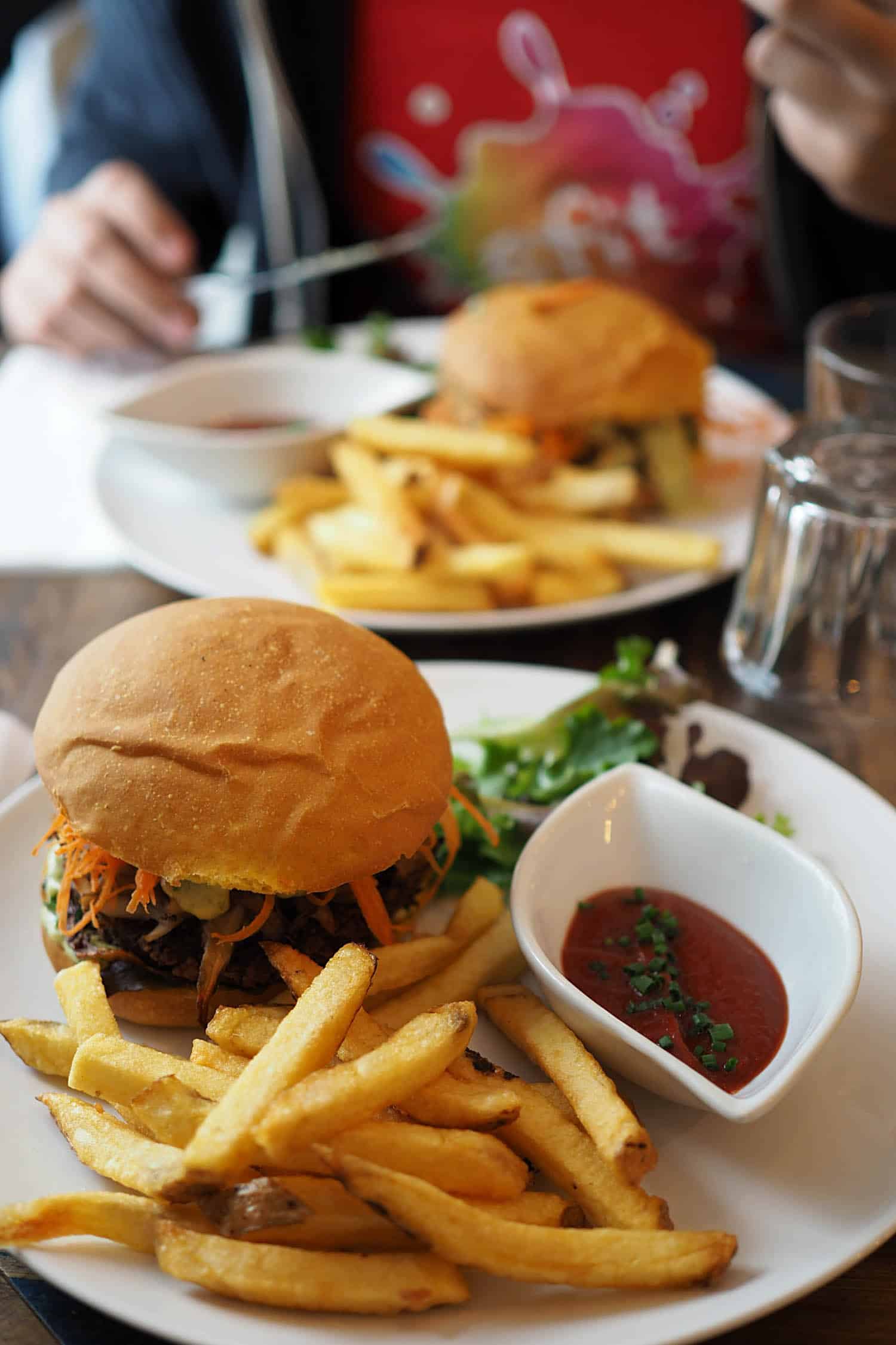 Cheeseburger and fries on a plate
