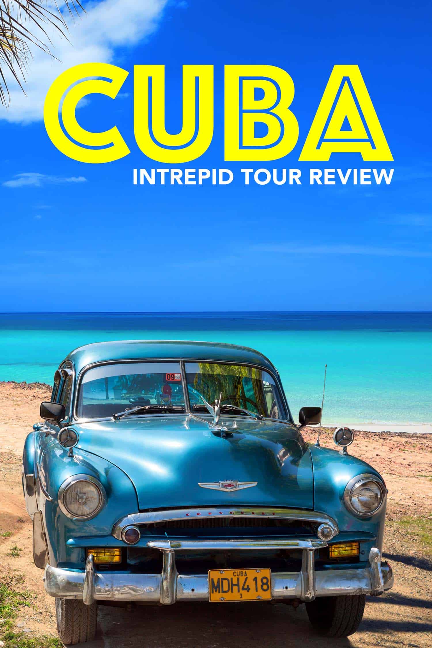 Vintage car by the beach in Cuba